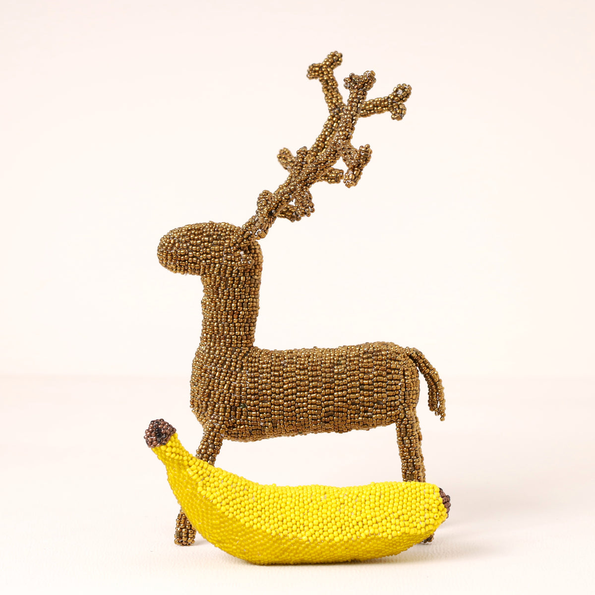 Handmade African beaded reindeer sculpture