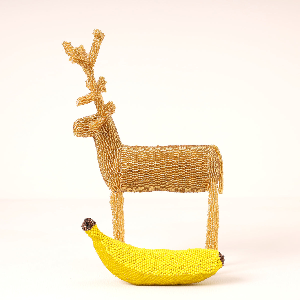 Handmade African beaded reindeer sculpture