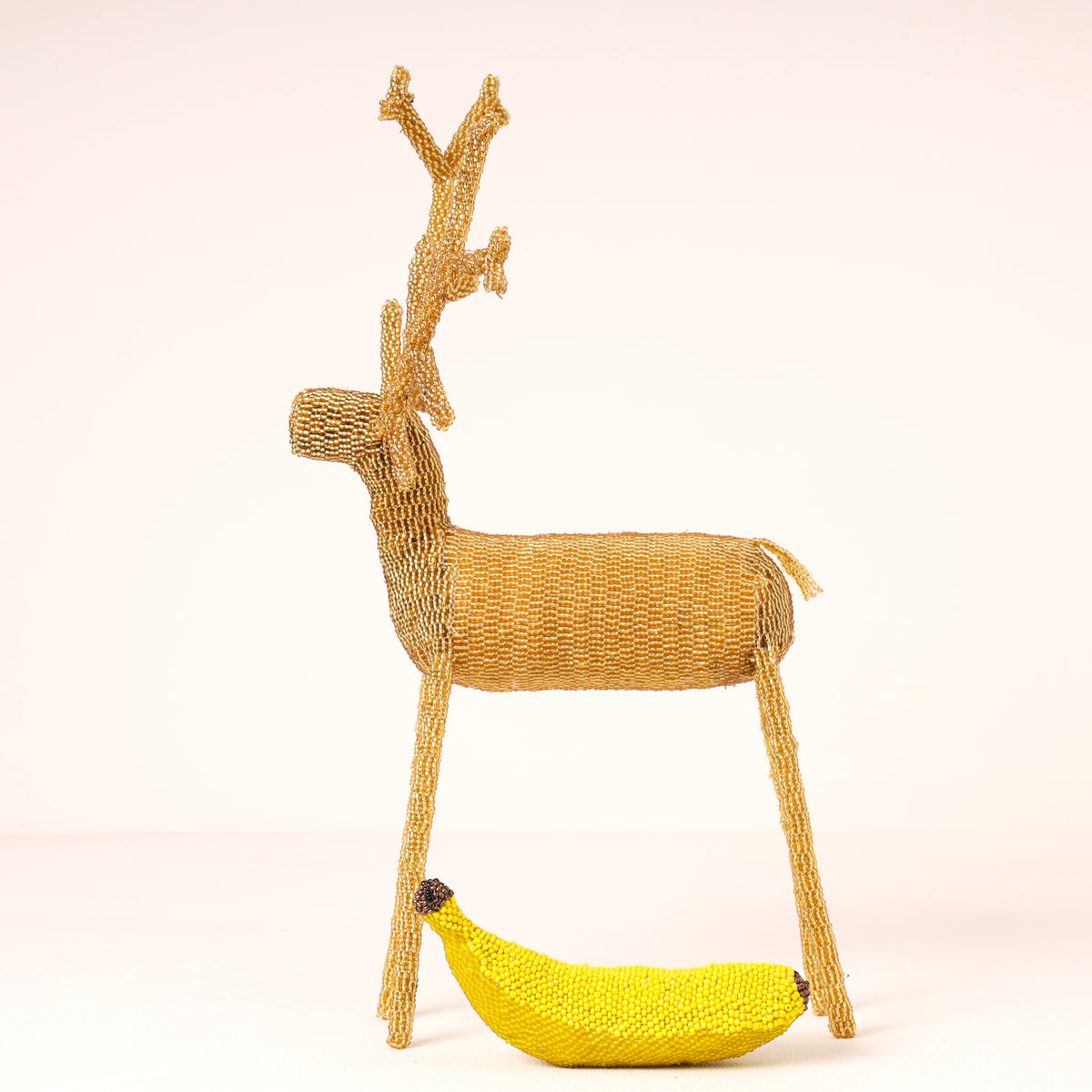 Handmade African beaded reindeer sculpture