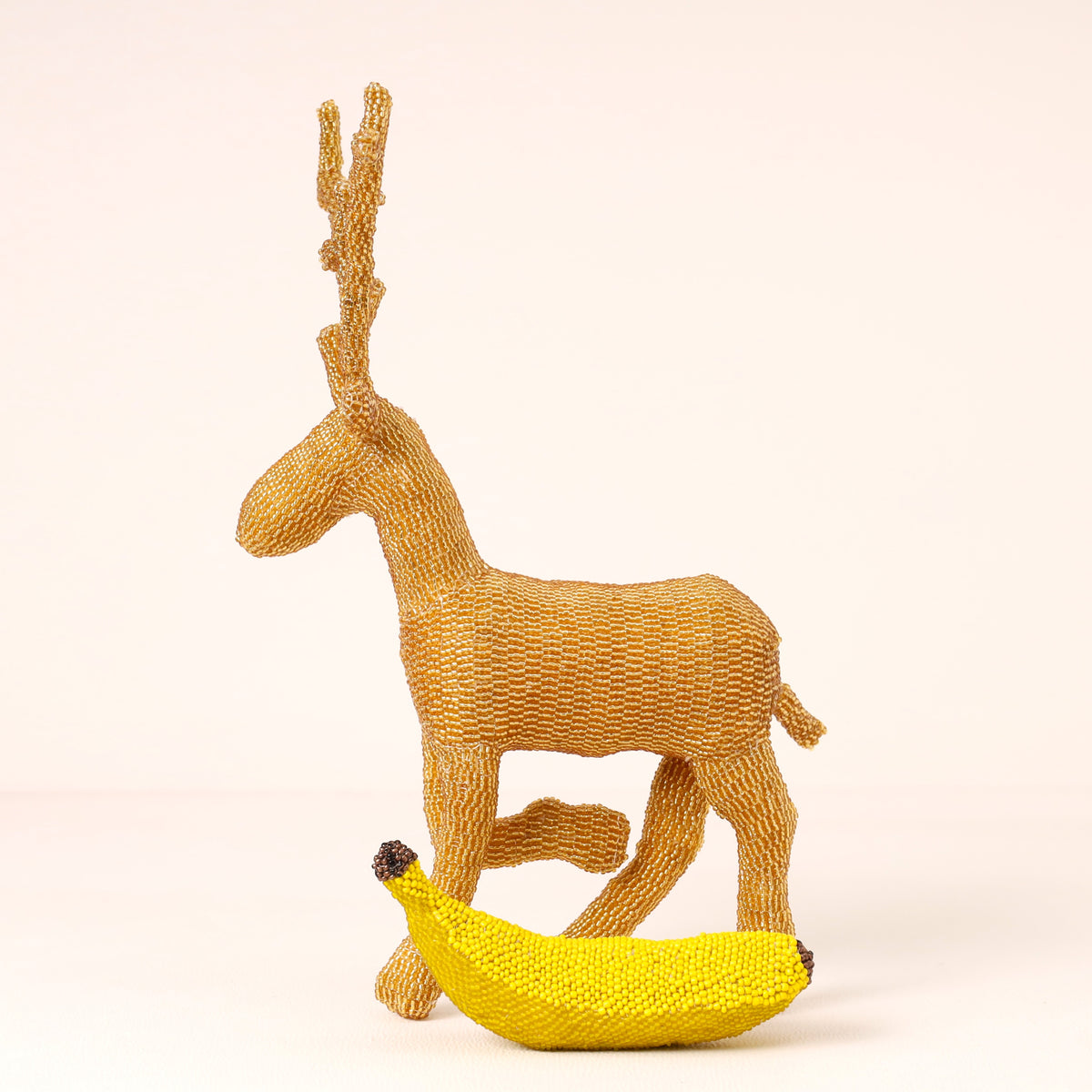 Handmade African beaded reindeer sculpture
