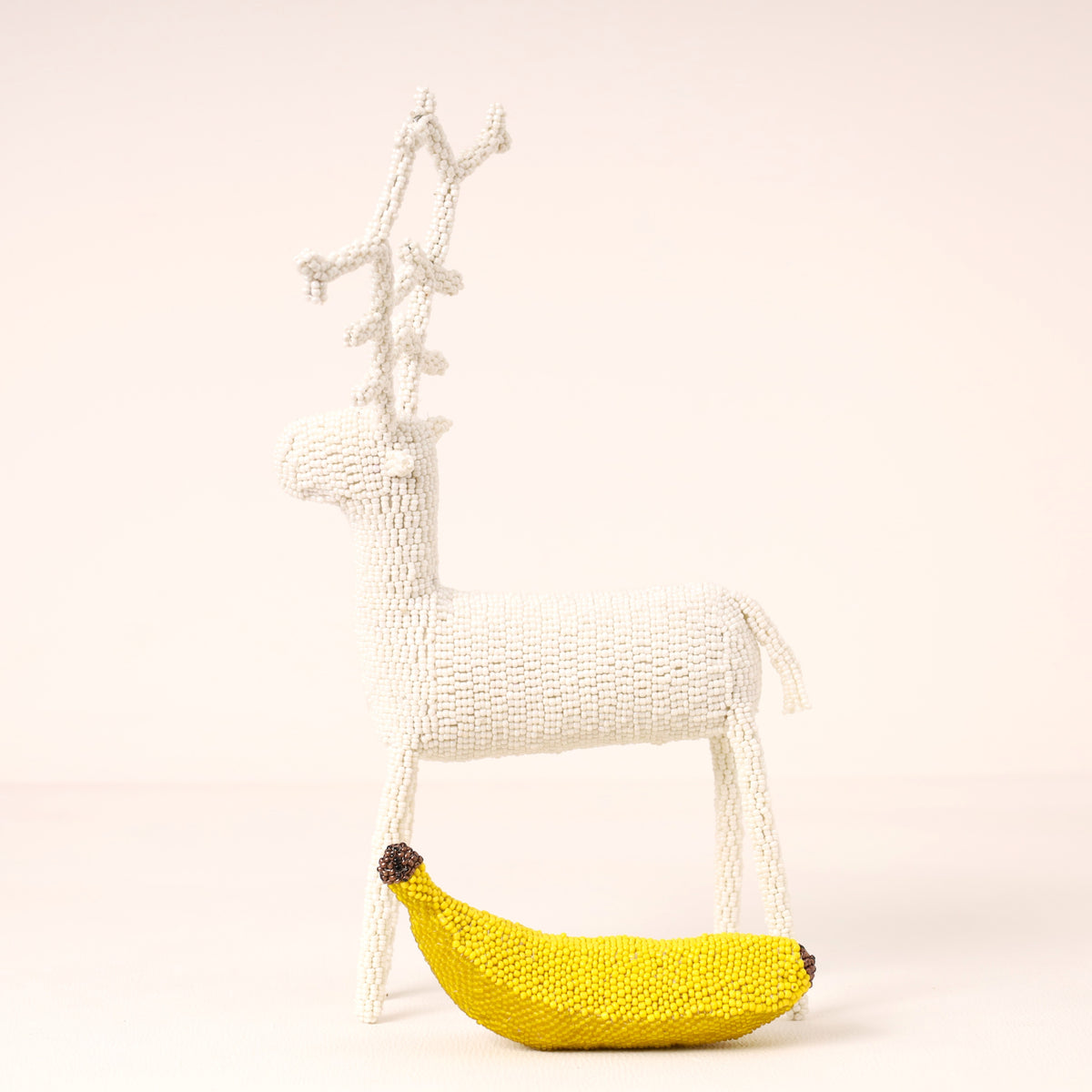 Handmade African beaded reindeer sculpture