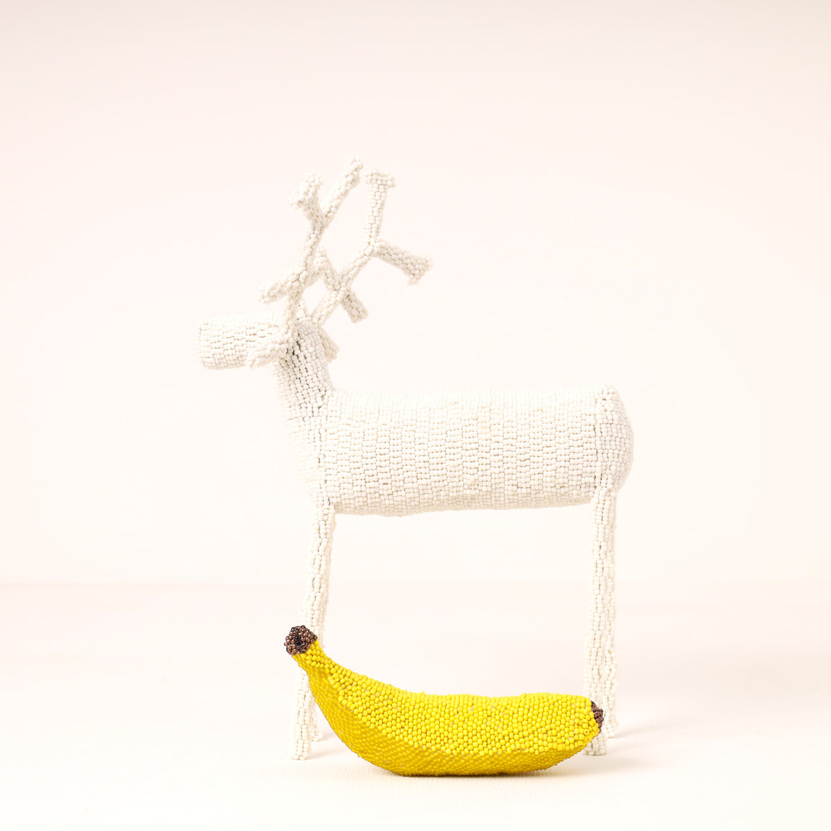 Handmade African beaded reindeer sculpture