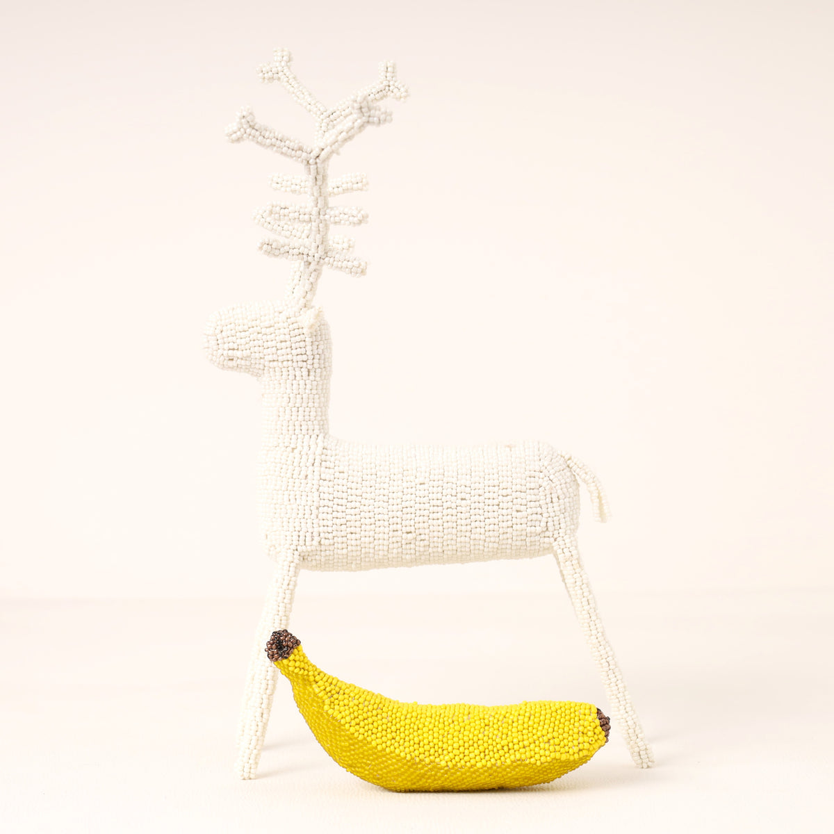 Handmade African beaded reindeer sculpture