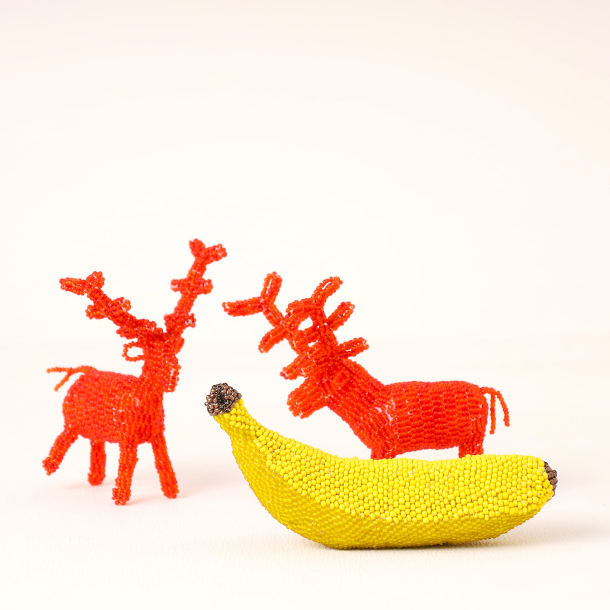 Handmade African beaded reindeer sculpture