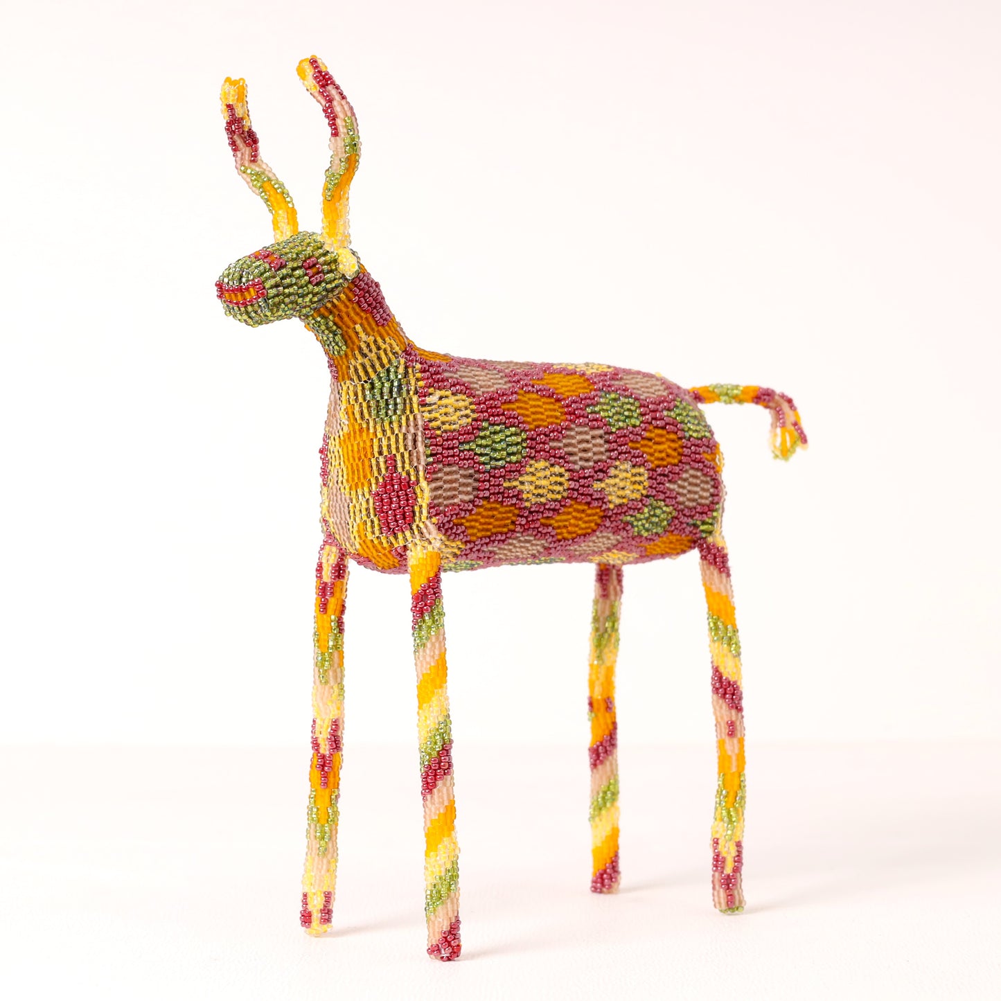 Handmade African beaded bokkie sculpture