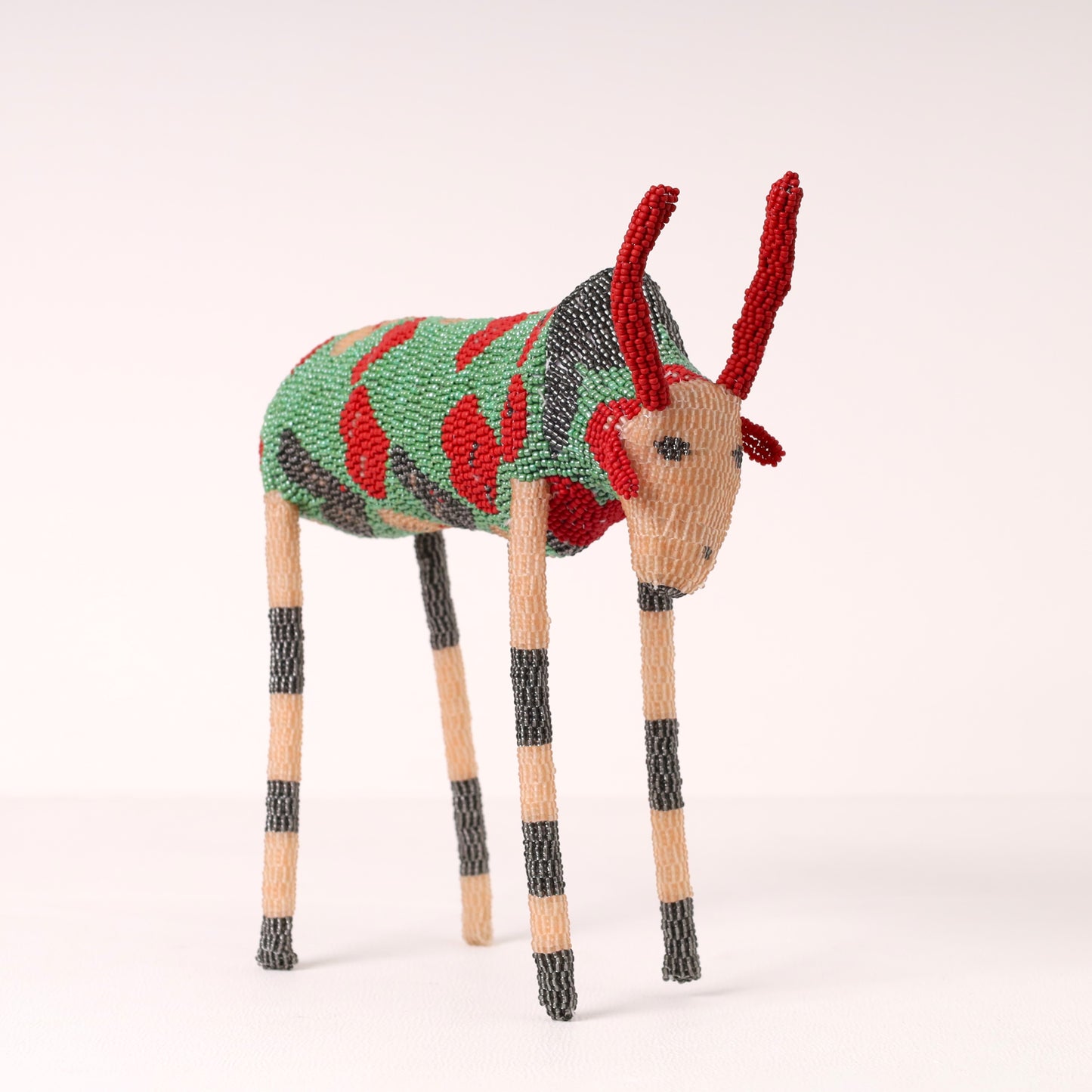 Handmade African beaded bull sculpture