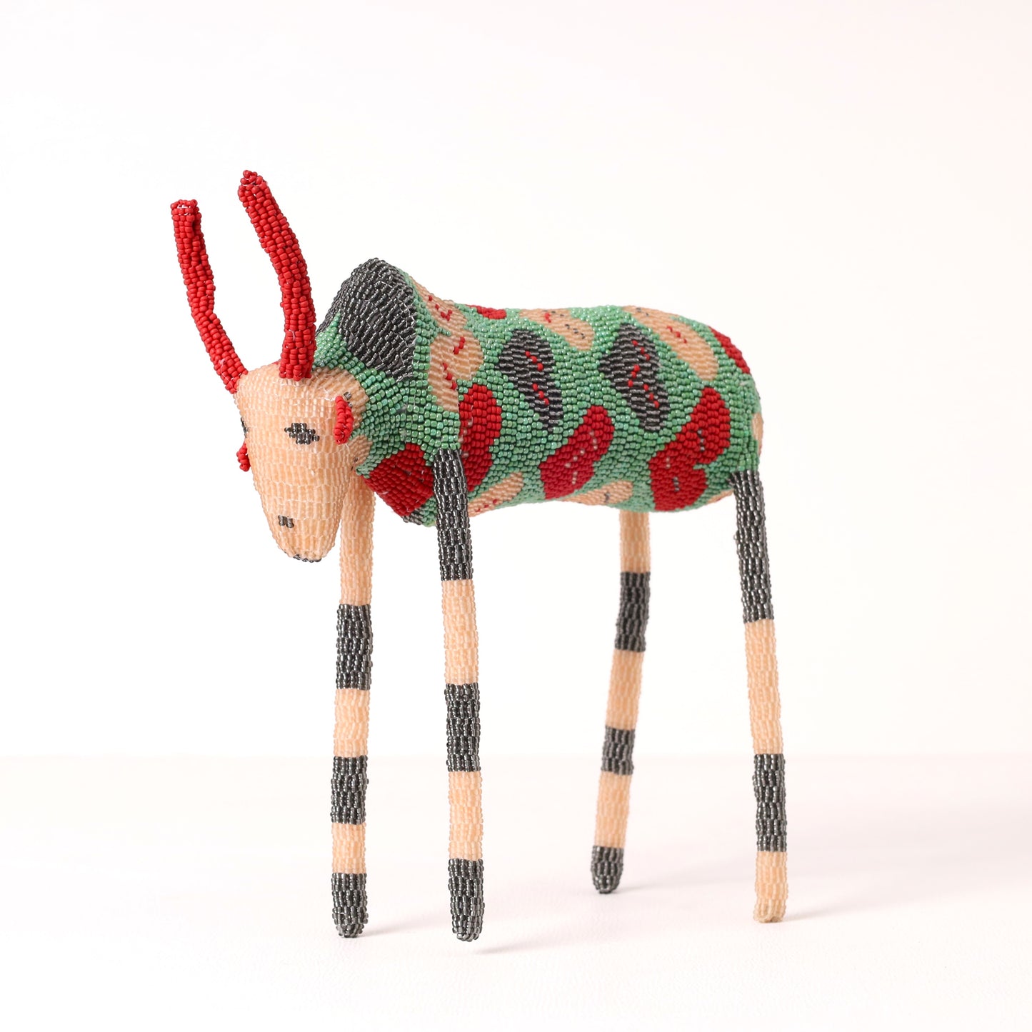 Handmade African beaded bull sculpture