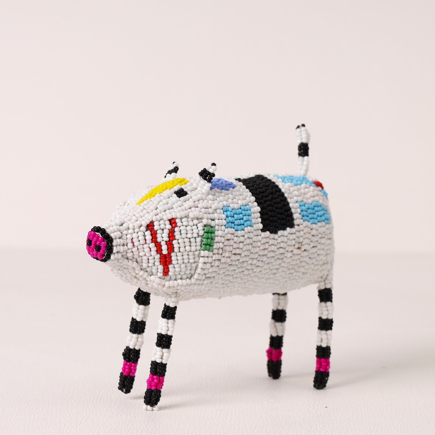 Handmade African beaded pig sculpture