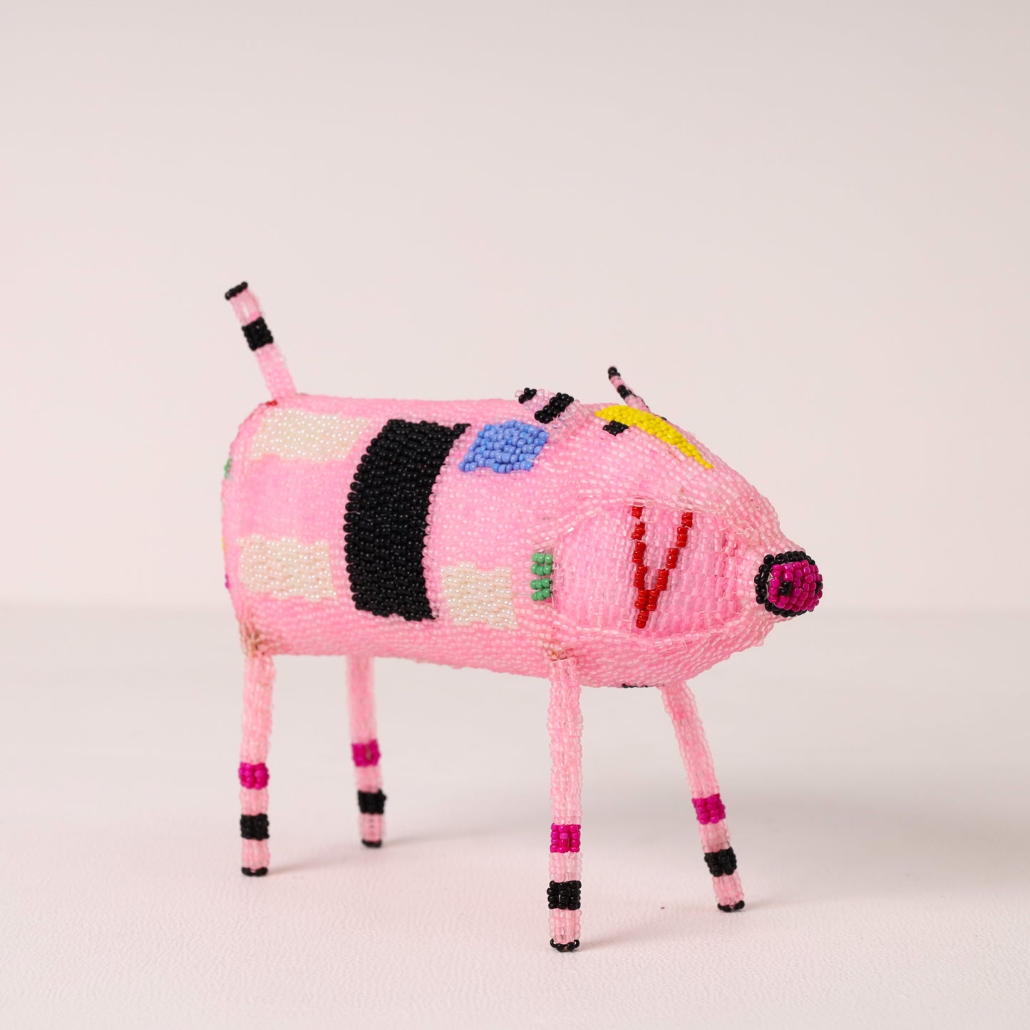 Handmade African beaded pig sculpture