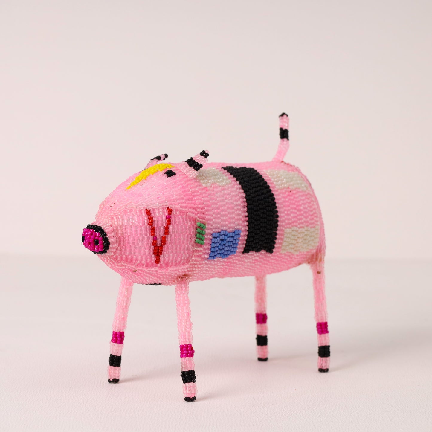 Handmade African beaded pig sculpture