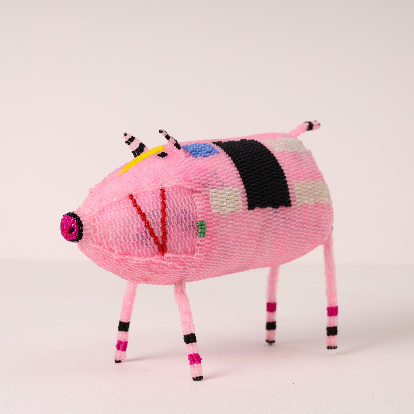 Handmade African beaded pig sculpture