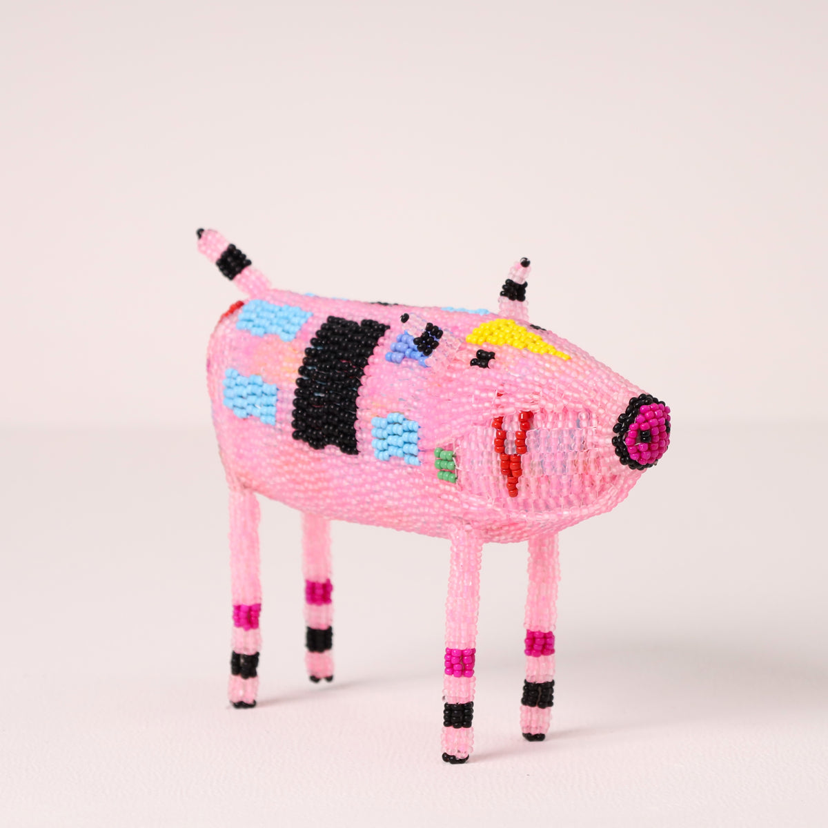 Handmade African beaded pig sculpture