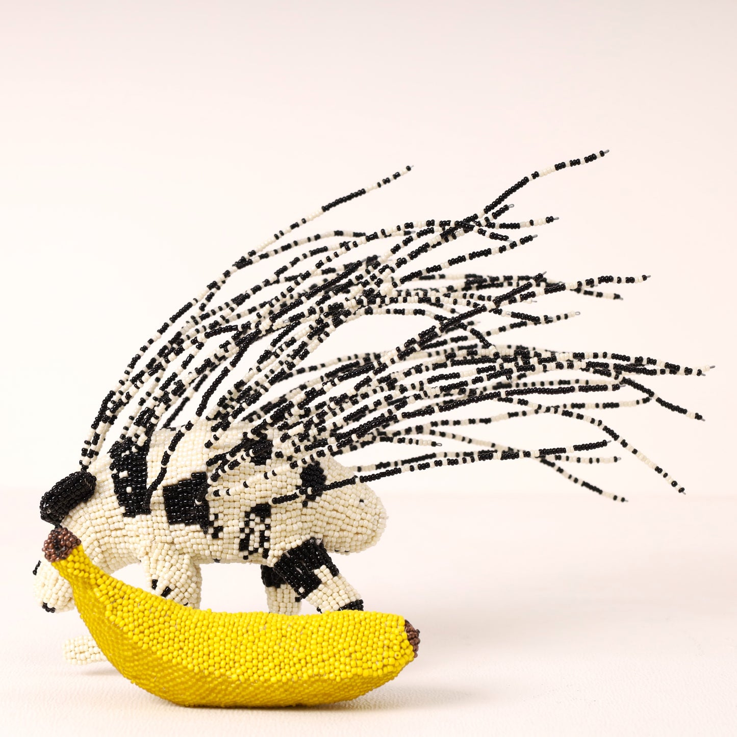 Handmade African beaded porcupine sculpture
