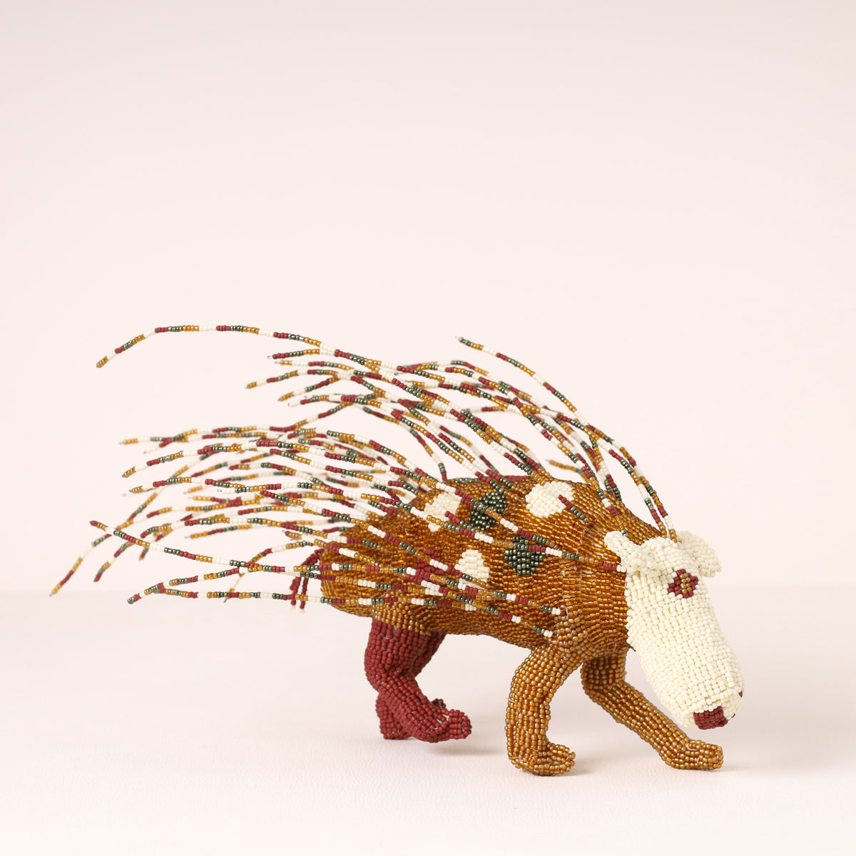 Handmade African beaded porcupine sculpture