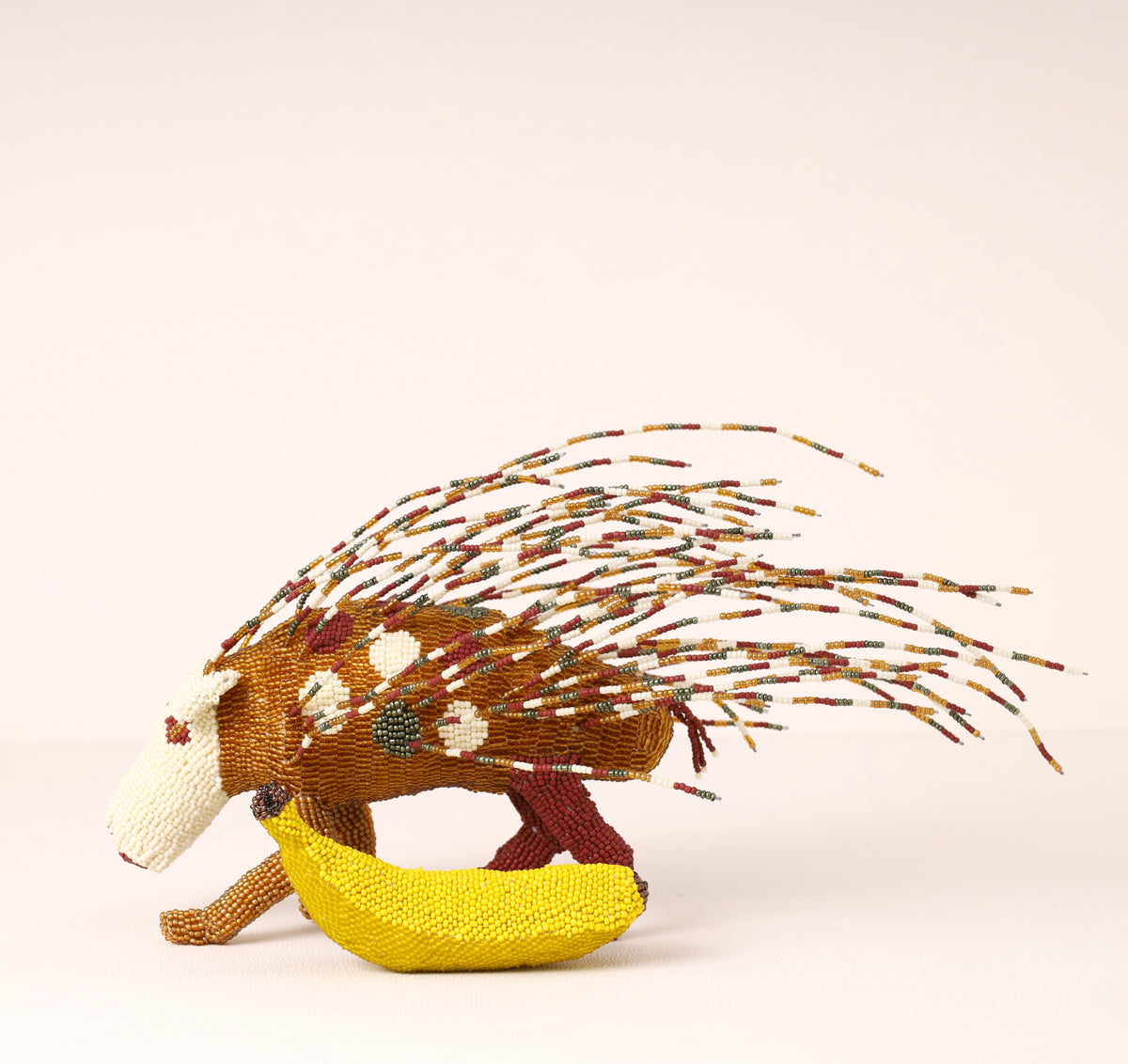 Handmade African beaded porcupine sculpture