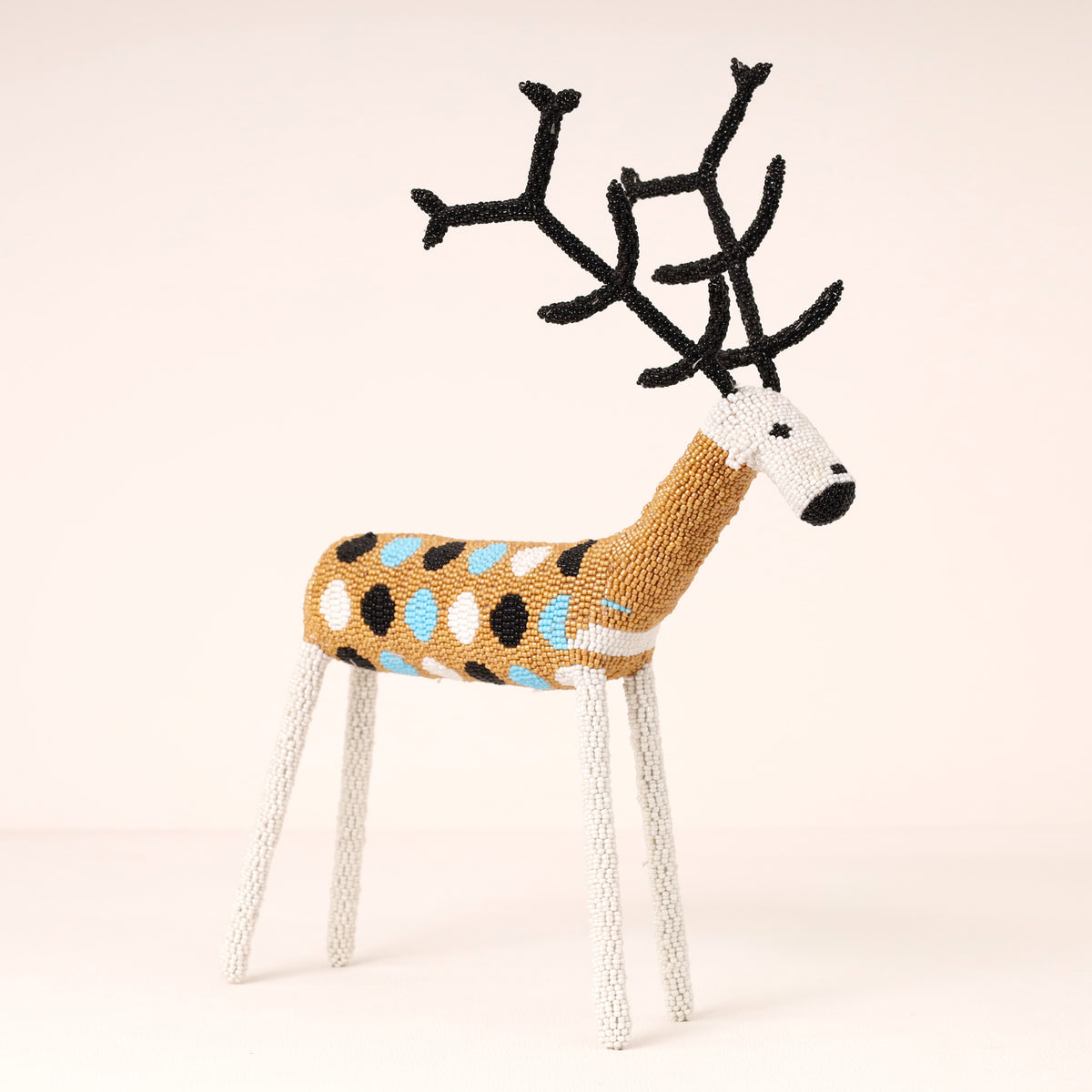 Handmade African beaded reindeer sculpture