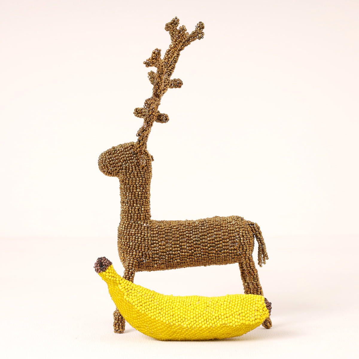 Handmade African beaded reindeer sculpture