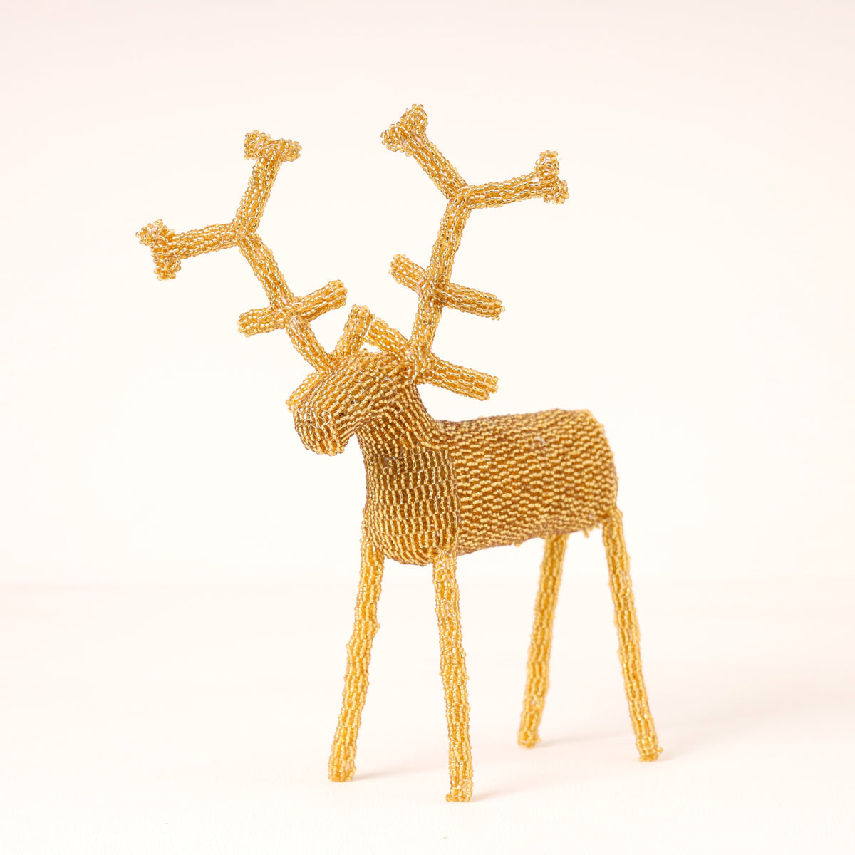 Handmade African beaded reindeer sculpture