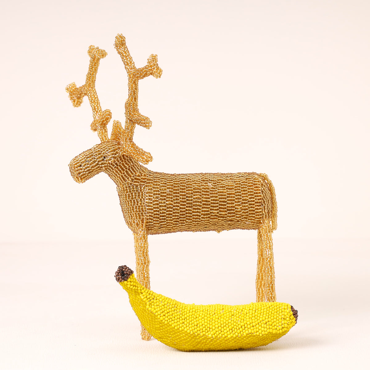 Handmade African beaded reindeer sculpture