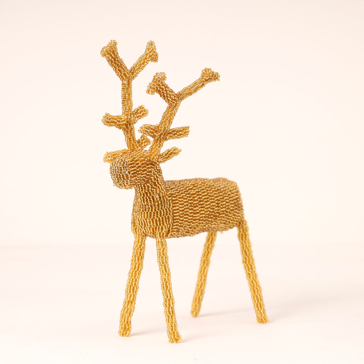 Handmade African beaded reindeer sculpture