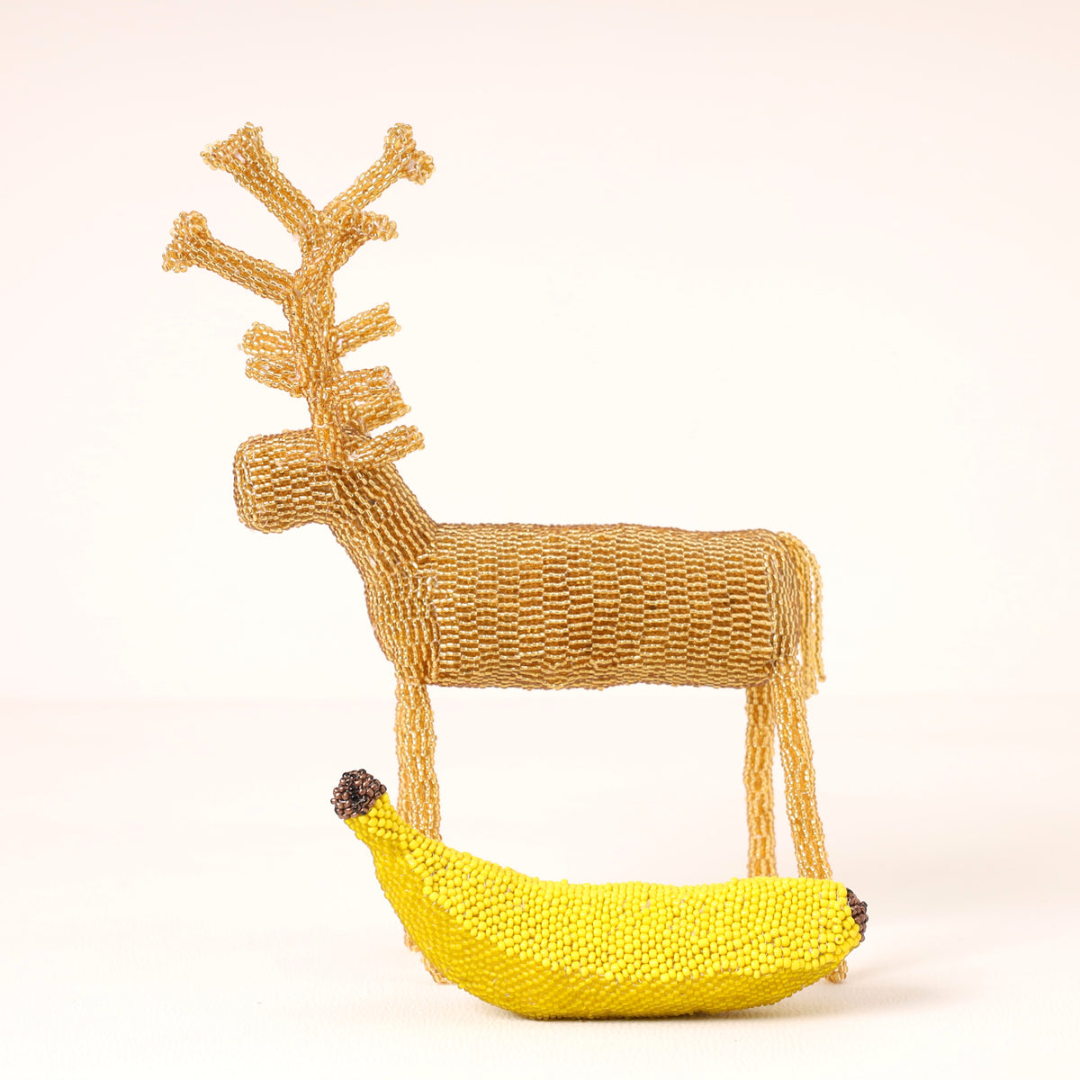 Handmade African beaded reindeer sculpture