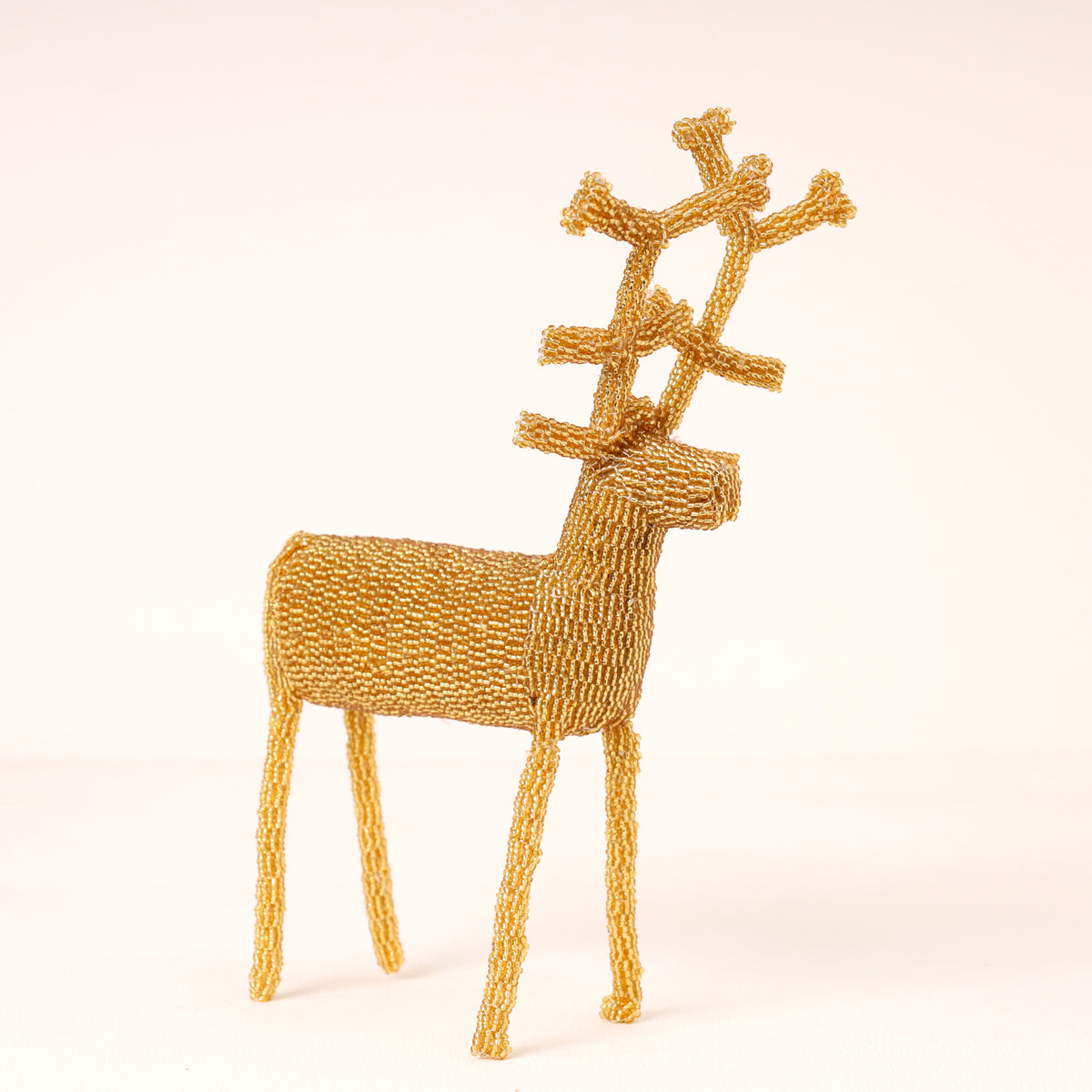 Handmade African beaded reindeer sculpture