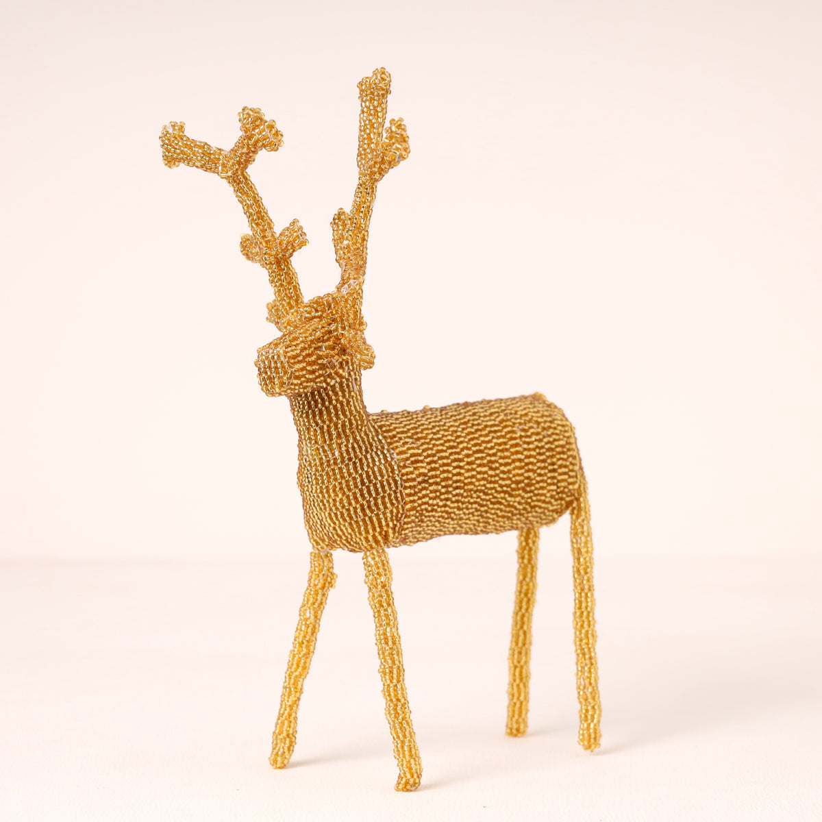 Handmade African beaded reindeer sculpture