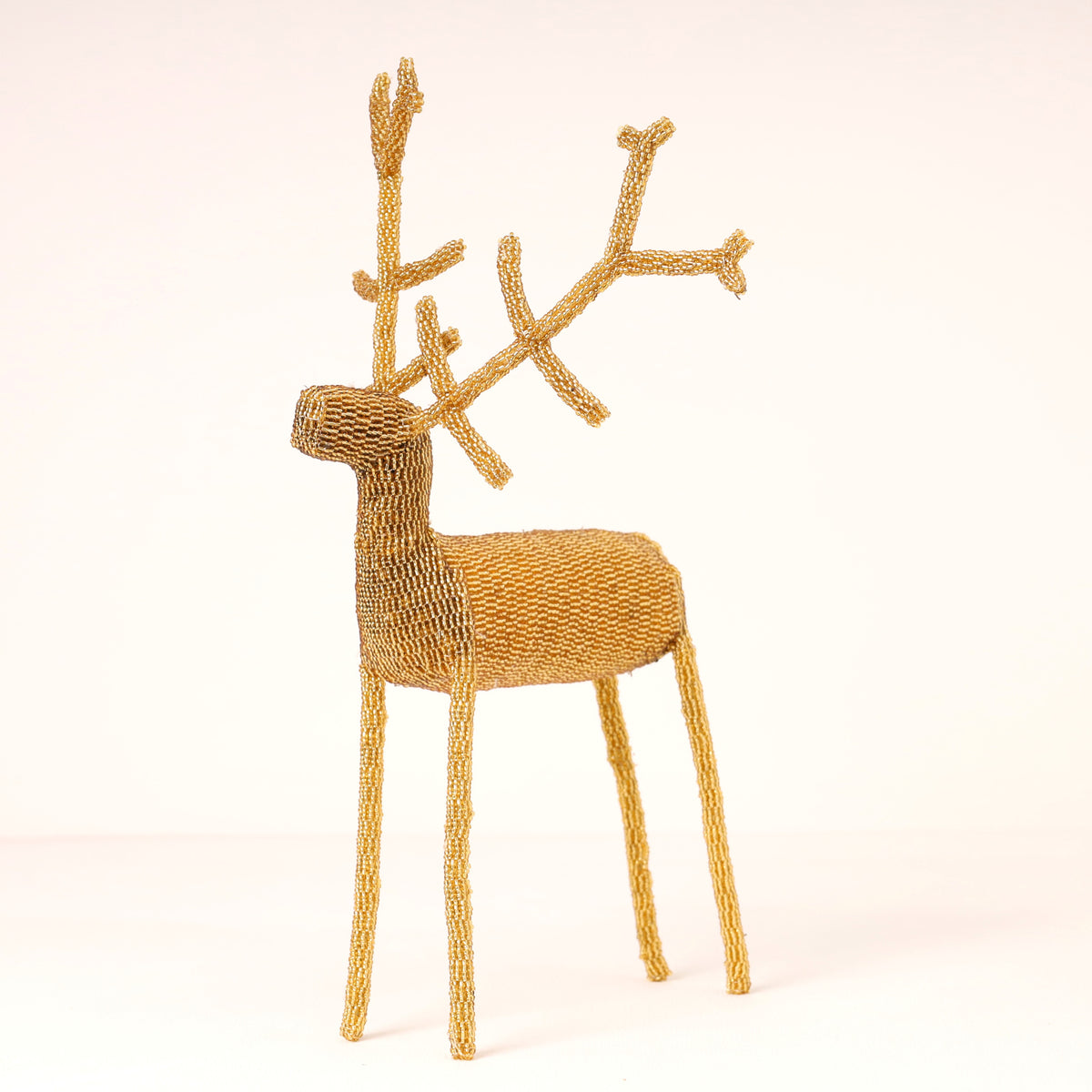Handmade African beaded reindeer sculpture