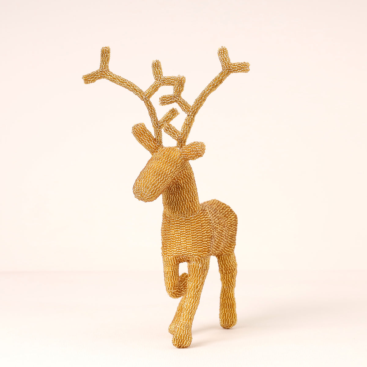 Handmade African beaded reindeer sculpture