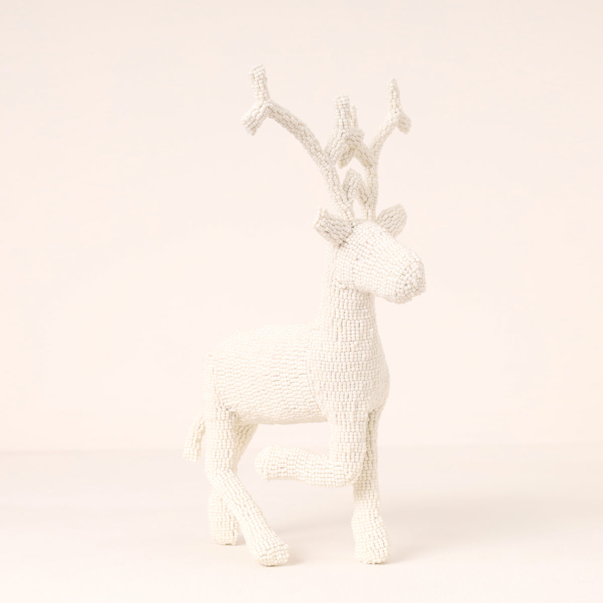 Handmade African beaded reindeer sculpture