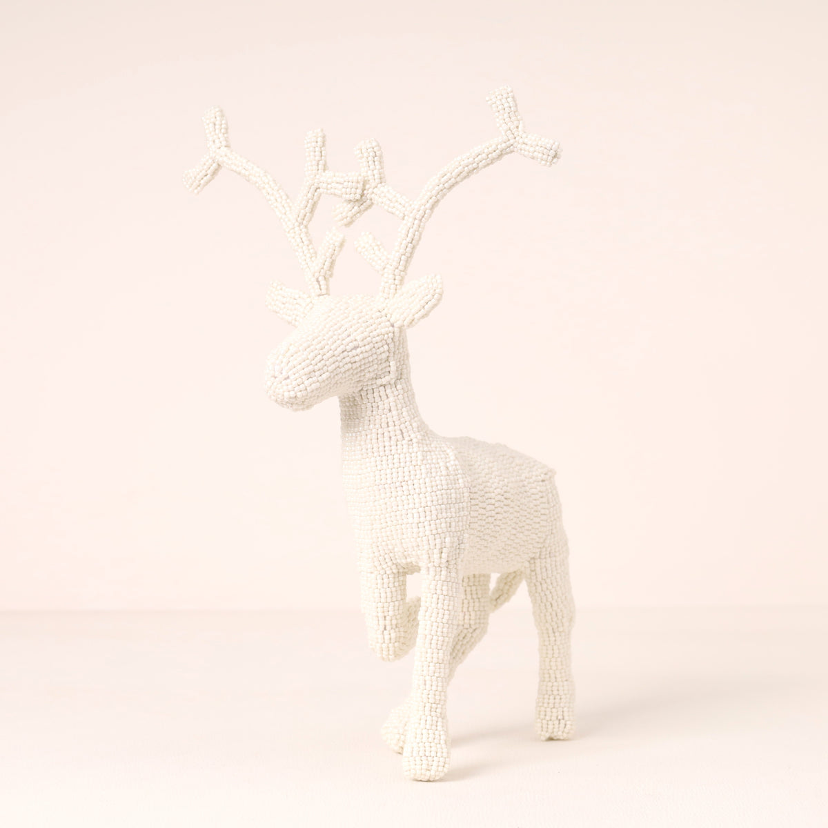 Handmade African beaded reindeer sculpture