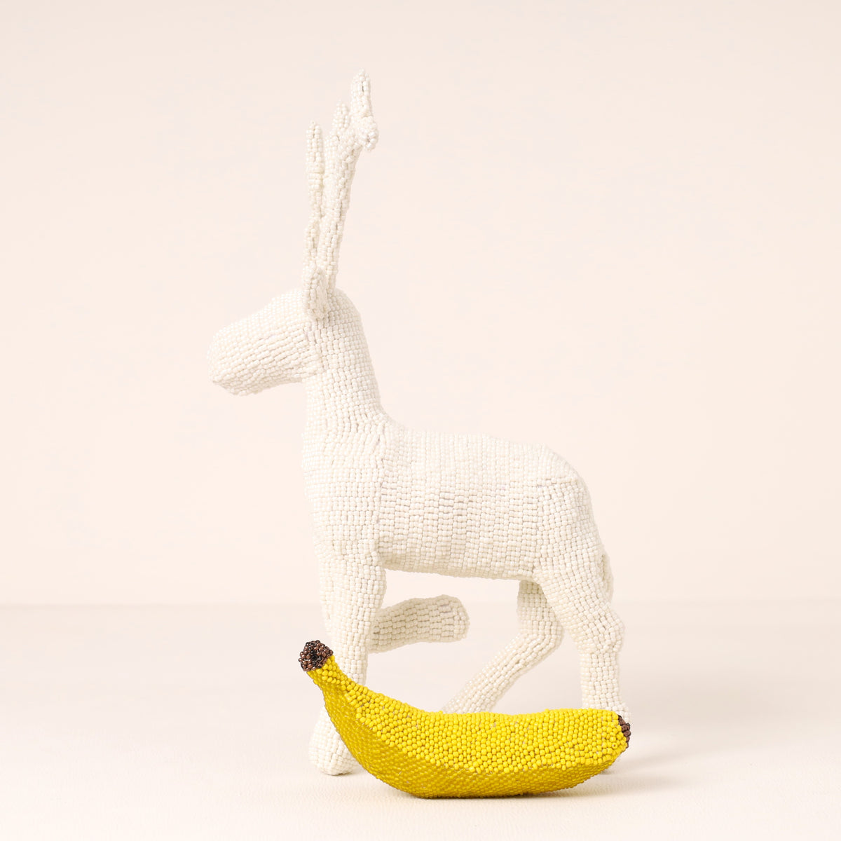 Handmade African beaded reindeer sculpture