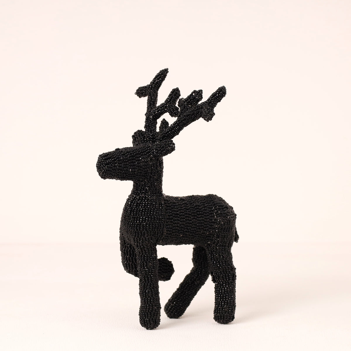 Handmade African beaded reindeer sculpture