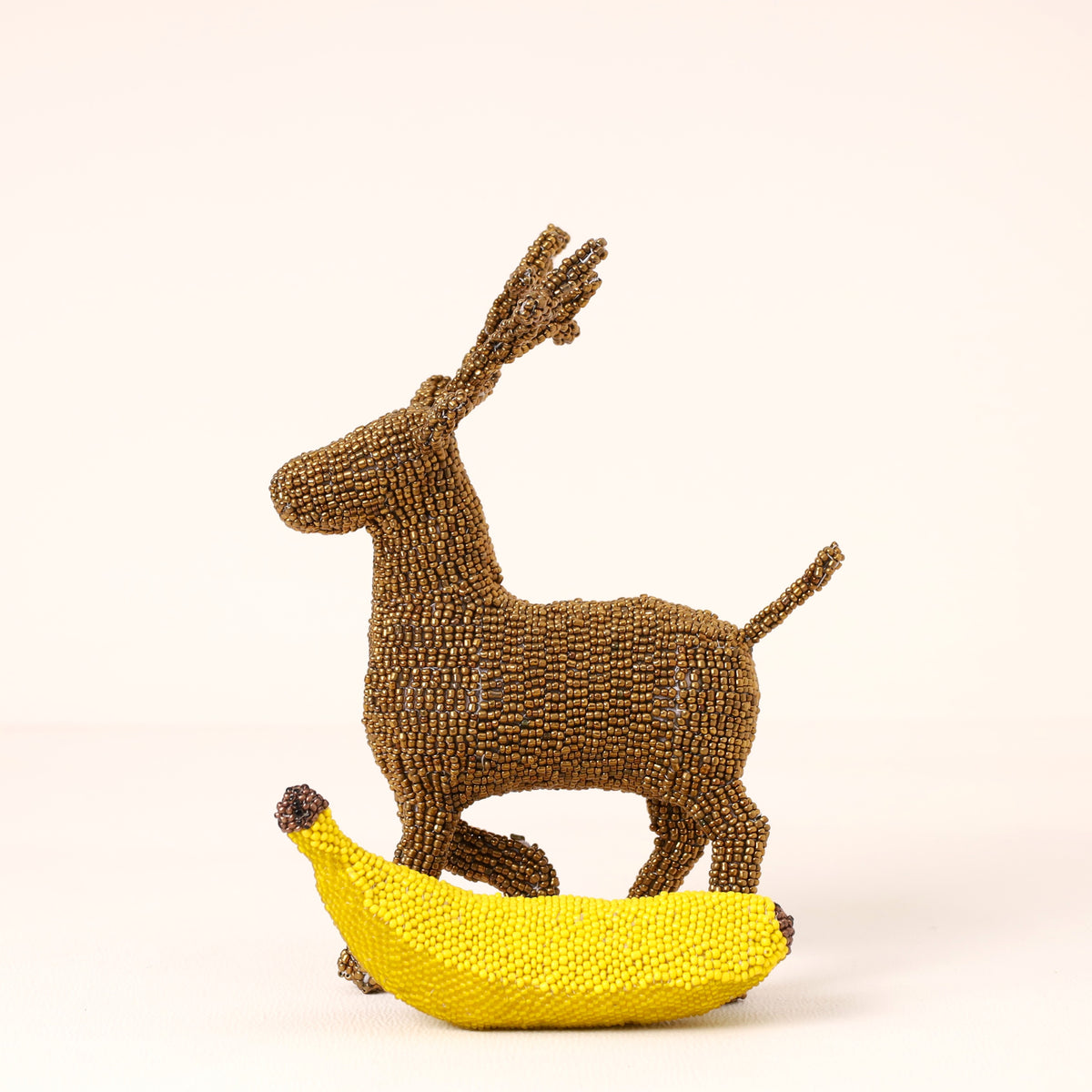 Handmade African beaded reindeer sculpture