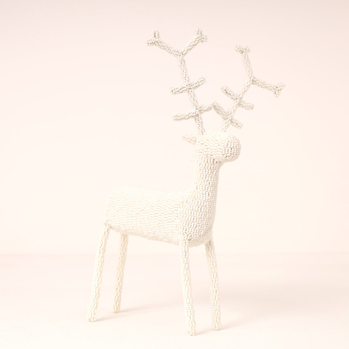 Handmade African beaded reindeer sculpture