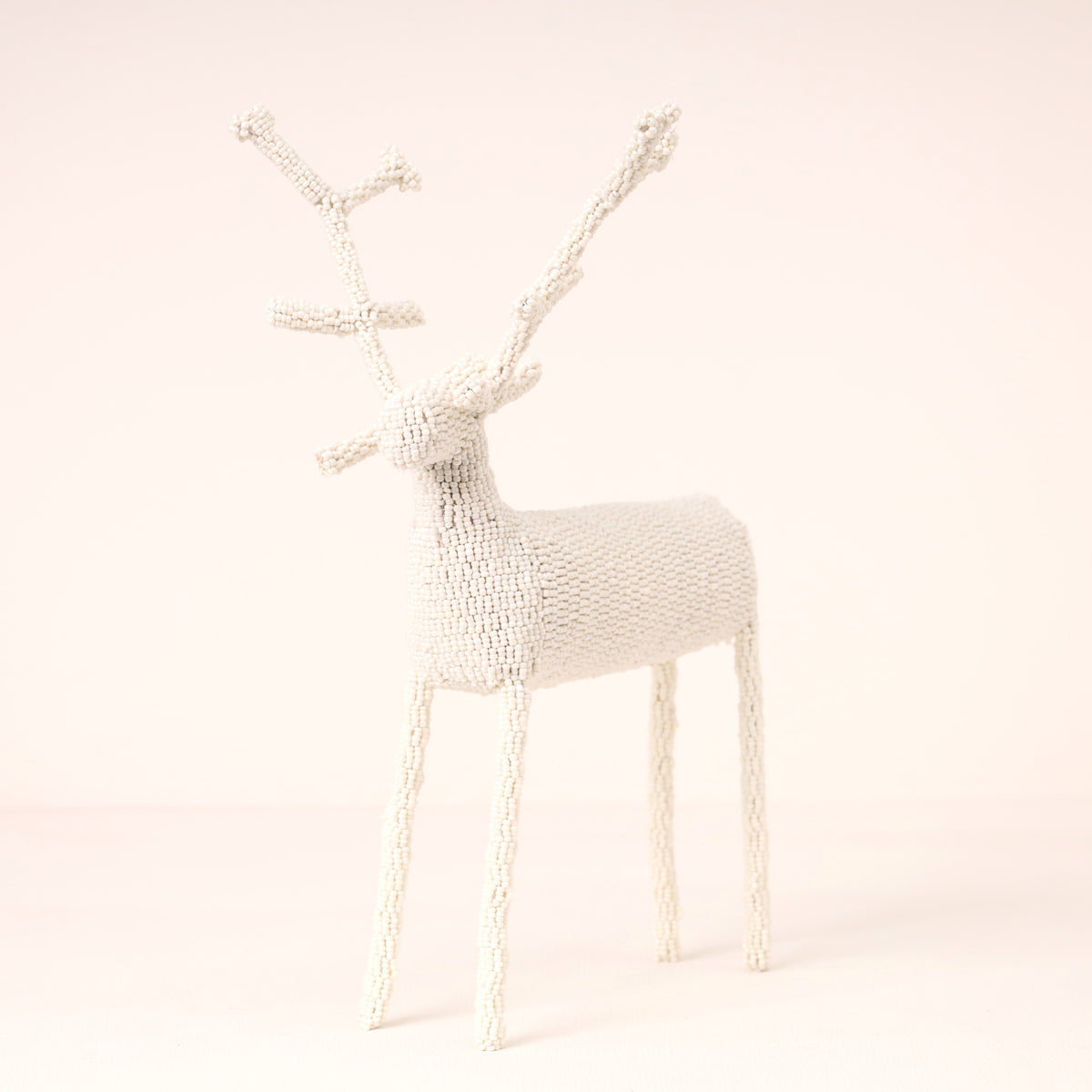 Handmade African beaded reindeer sculpture