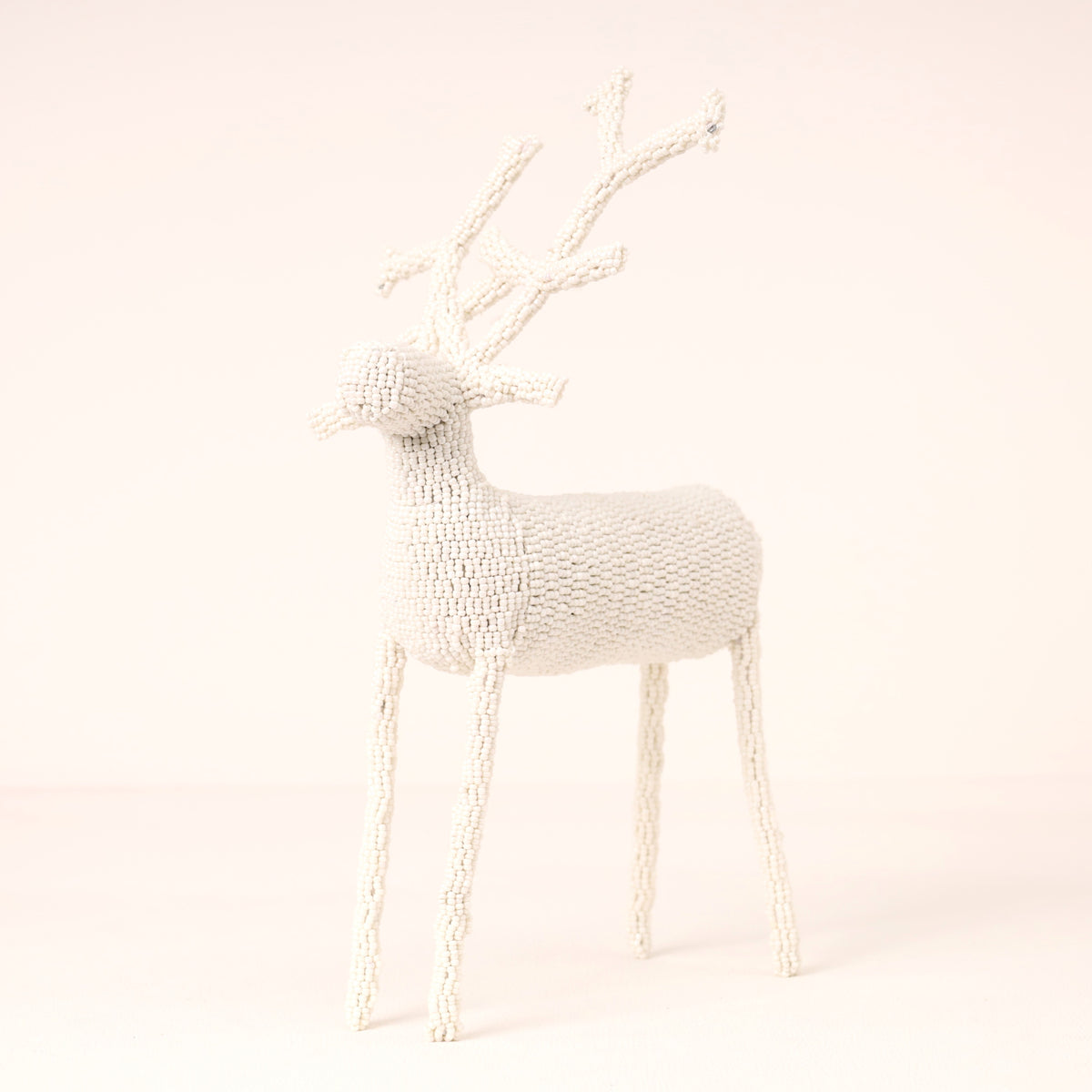 Handmade African beaded reindeer sculpture
