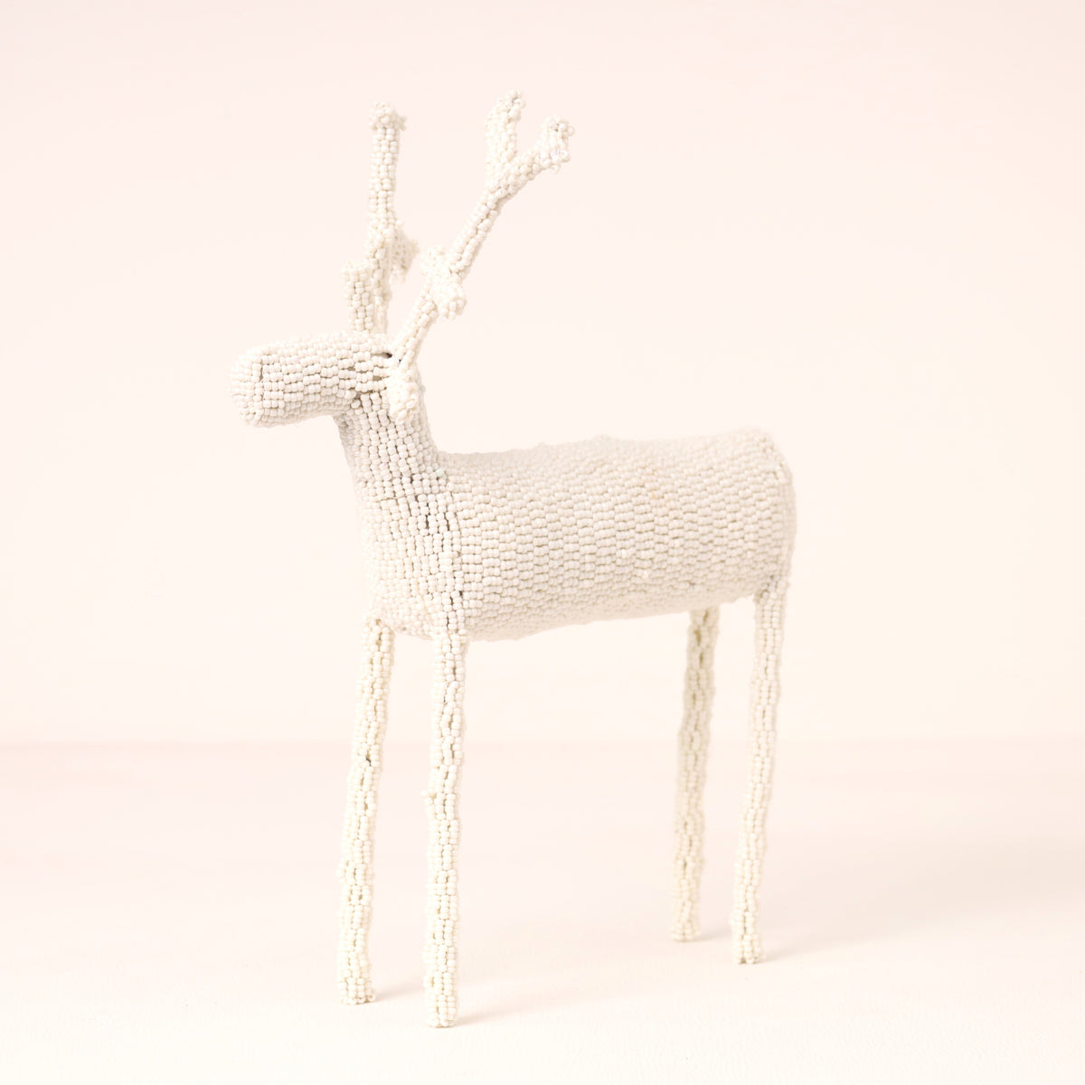 Handmade African beaded reindeer sculpture