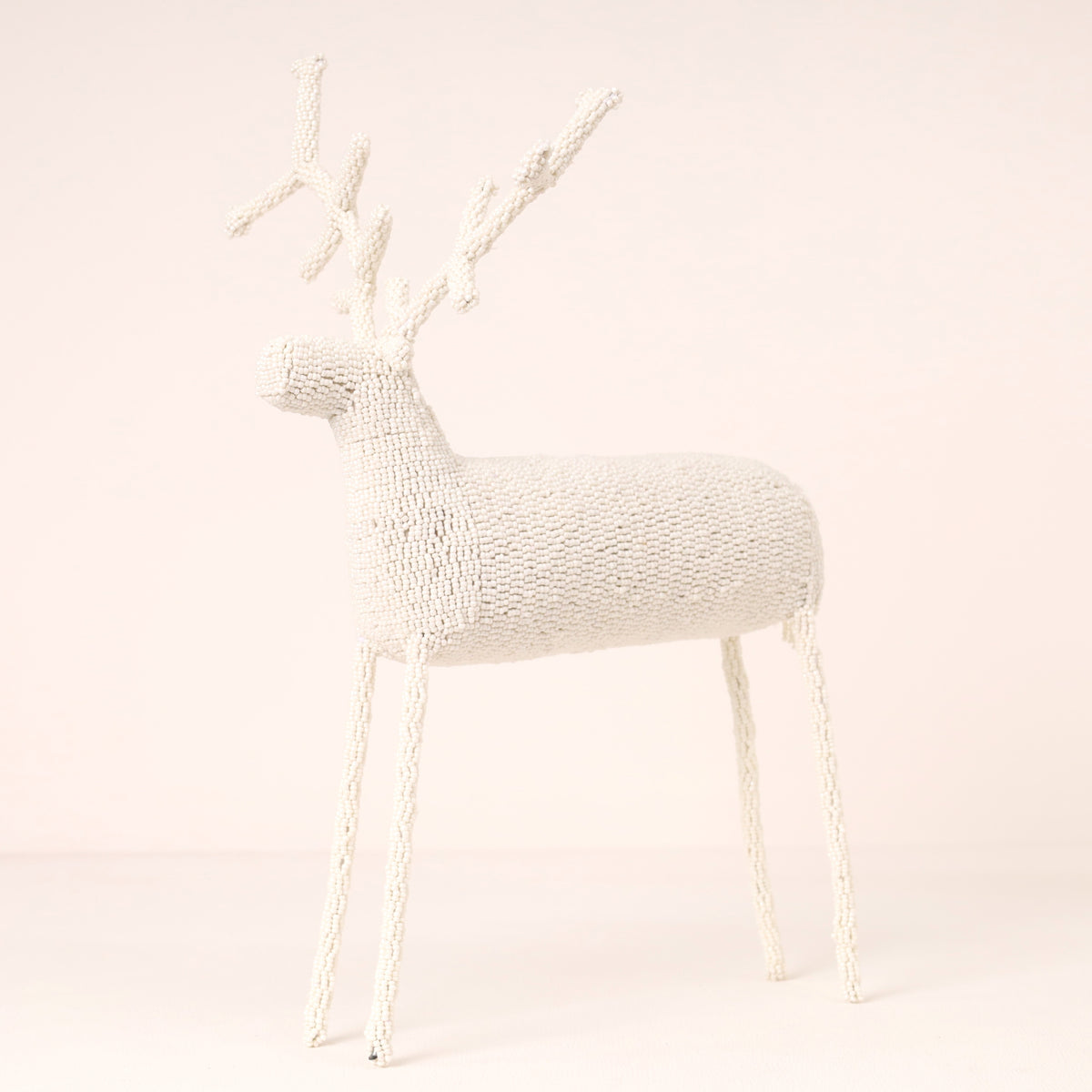 Handmade African beaded reindeer sculpture
