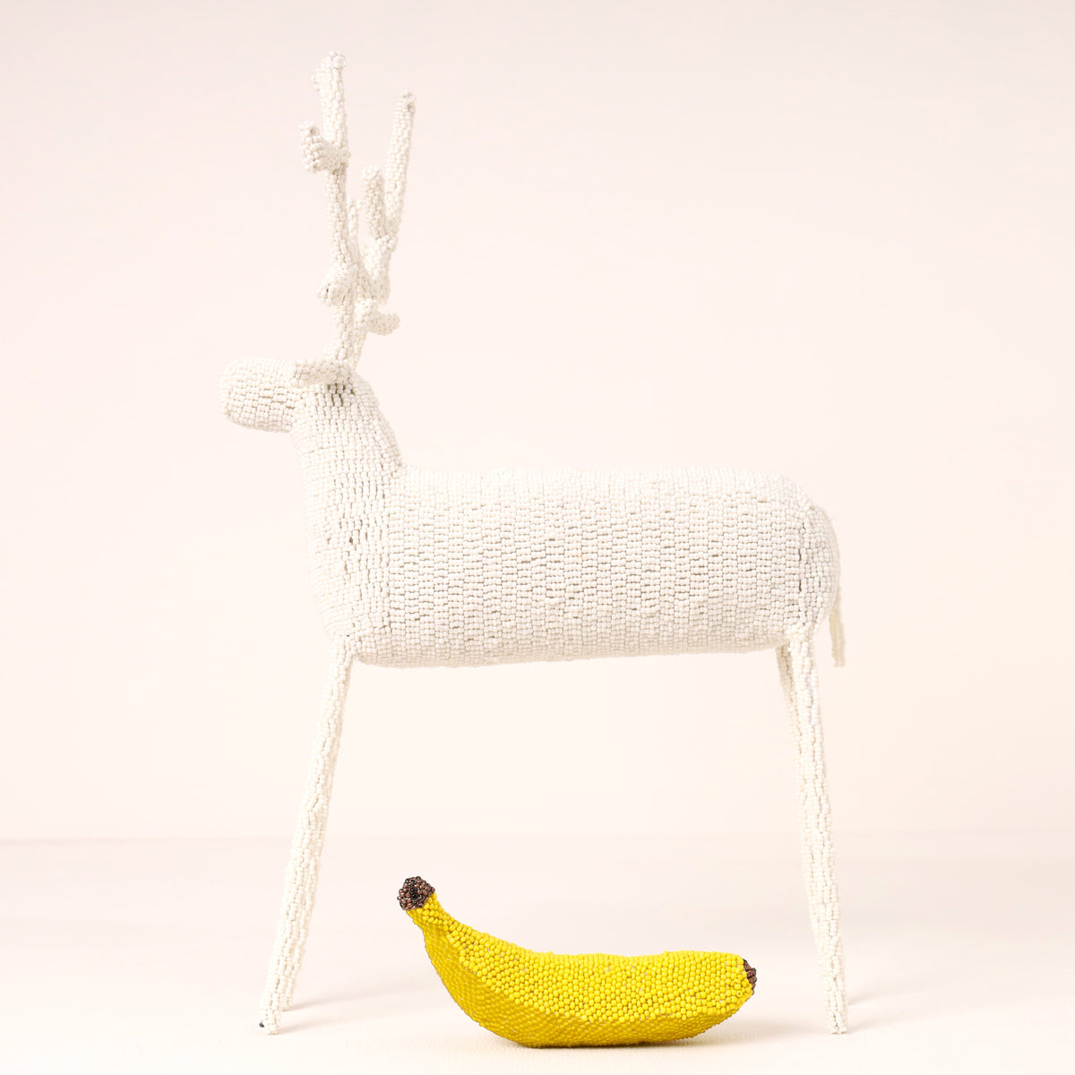 Handmade African beaded reindeer sculpture