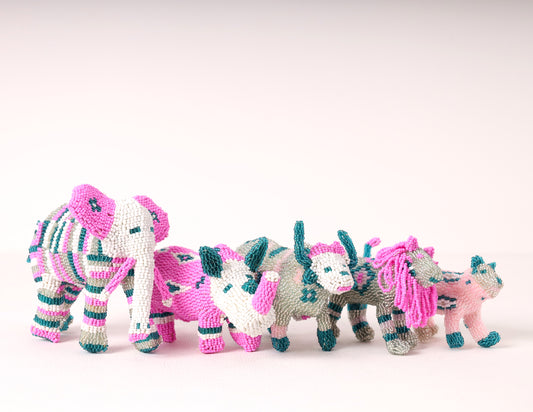 A handmade beaded big five sculpture, featuring pink, blue, white and silver. 